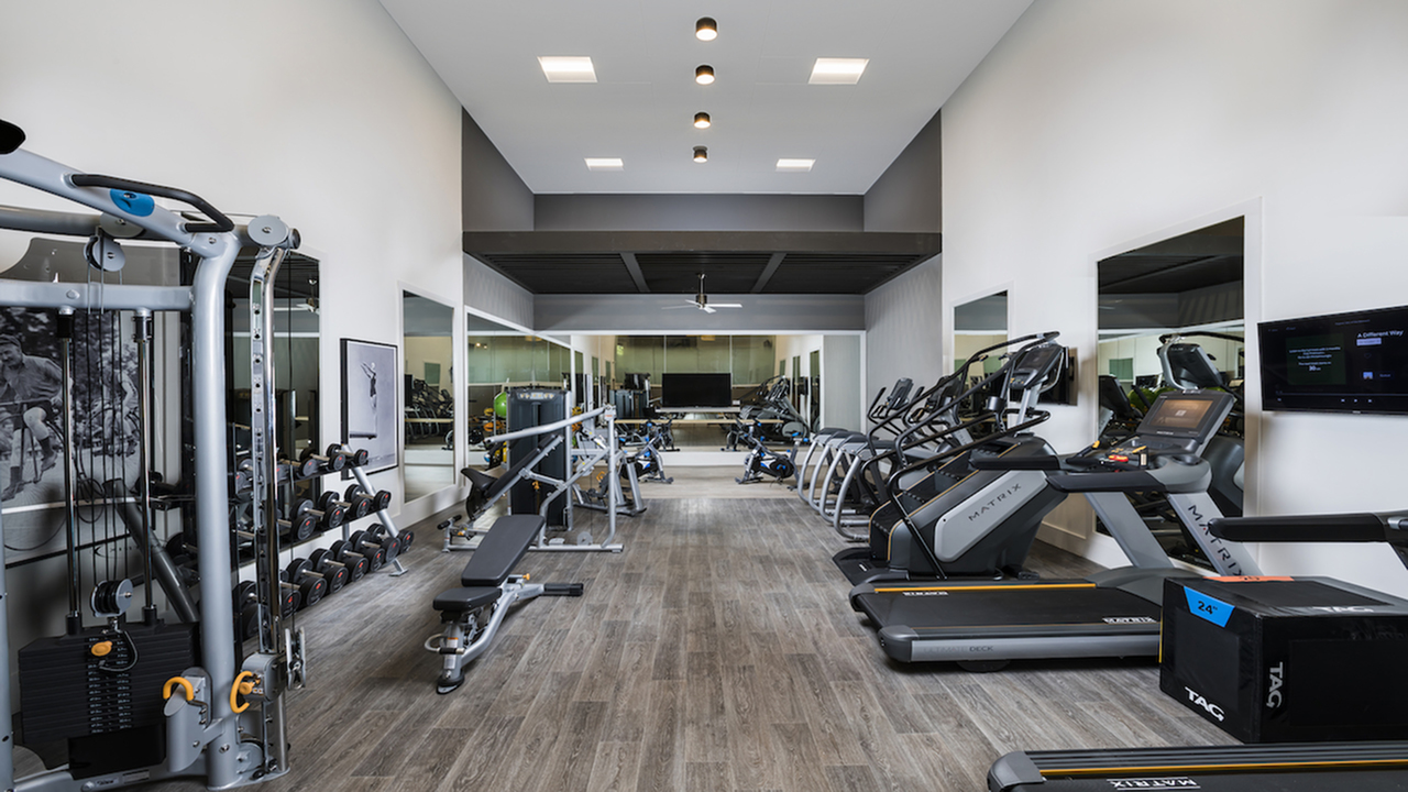 Redesigned Fitness Center with cardio equipment, free weights and machines at Autumn Columbia apartments.