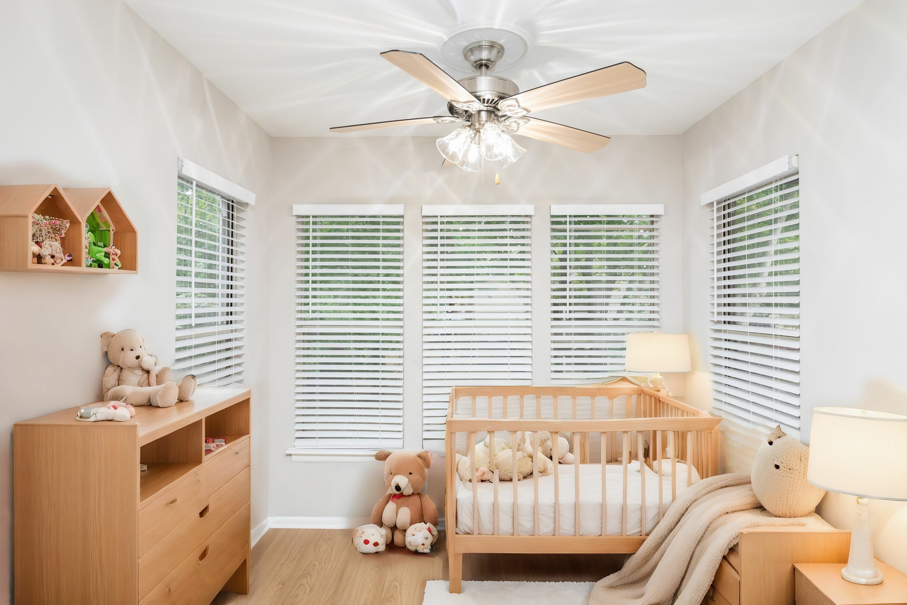Carpeted Children's Bedroom with Large Windows in an Autumn Columbia apartment.