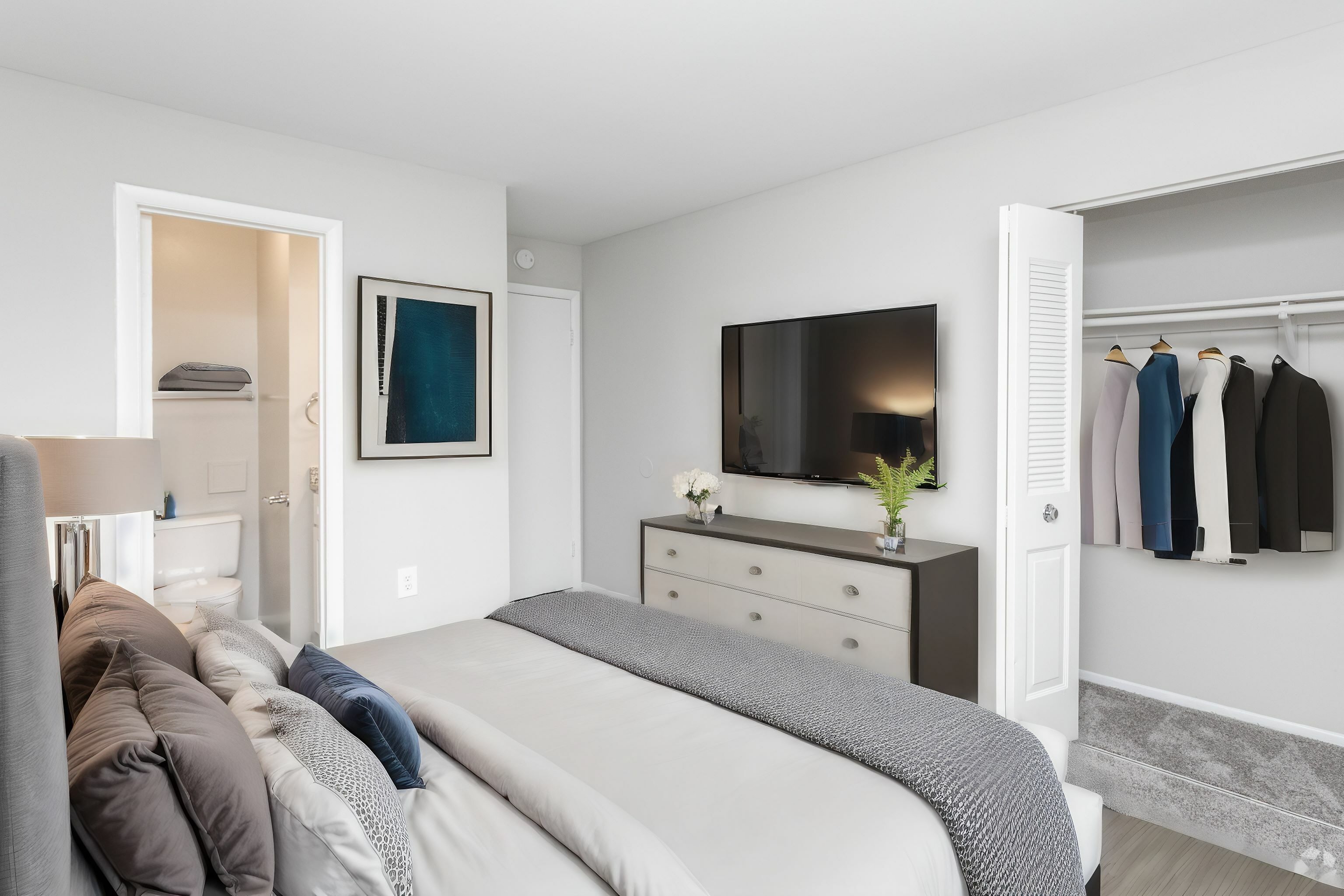 Expansive home featuring wood plank-style flooring throughout  in an Autumn Columbia apartment.