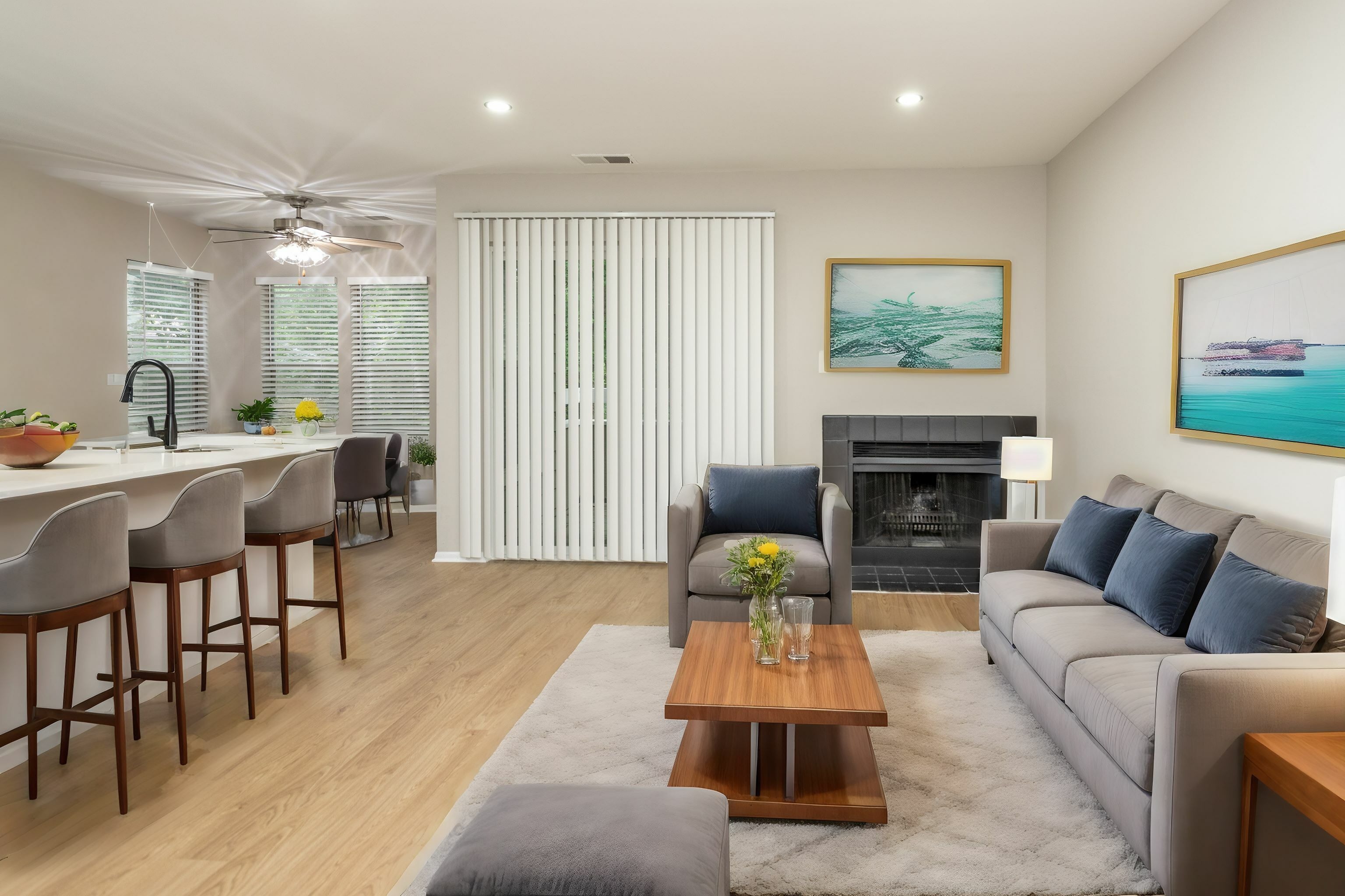 Updated, Open Layout with Kitchen and Separate Dining Area featuring wood plank flooring and bright finishes in an Autumn Columbia apartment.