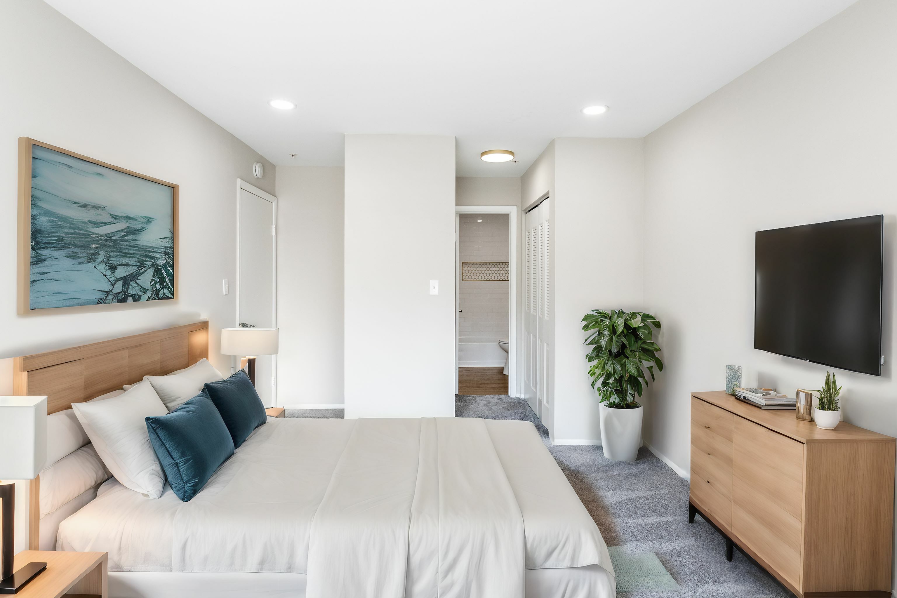 Luxurious bedroom in an Autumn Town Center apartment.