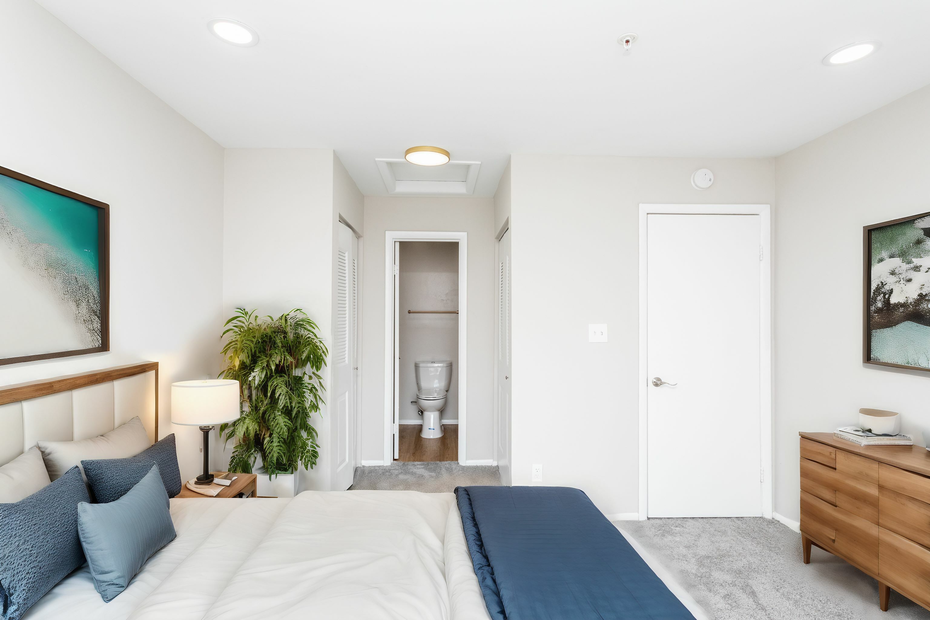 Open Floor Plans with Kitchens Overlooking Living Spaces in an Autumn Town Center apartment.