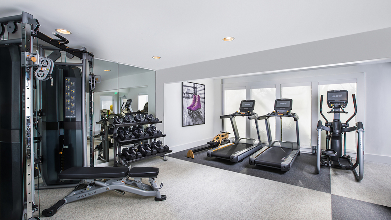 State-of-the-Art Fitness Center with Free Weights, Weight Machines, and Cardio Equipment