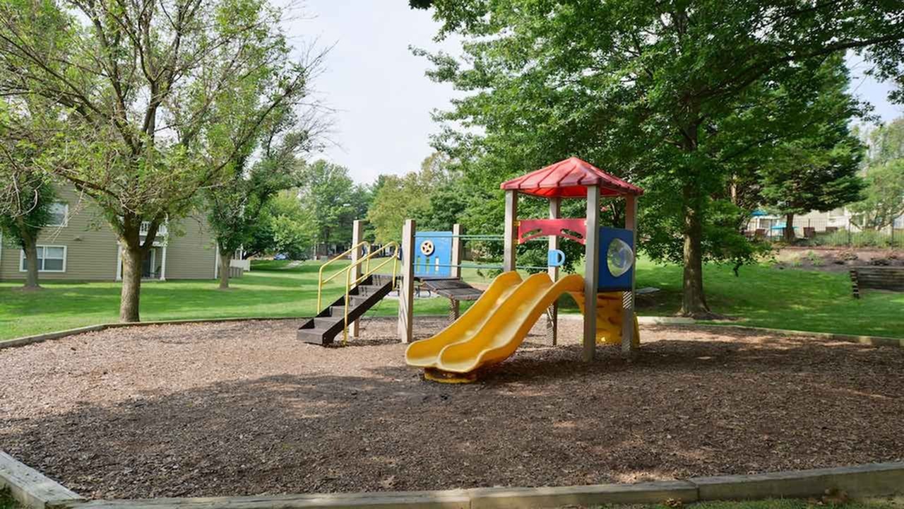 Image of Sprawling landscaped grounds in the middle of Fairway Hills Golf Course for Autumn Town Center