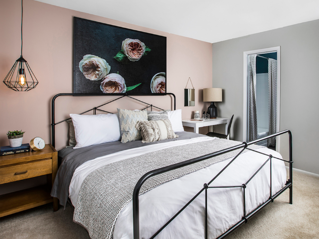 King sized bedroom with furniture