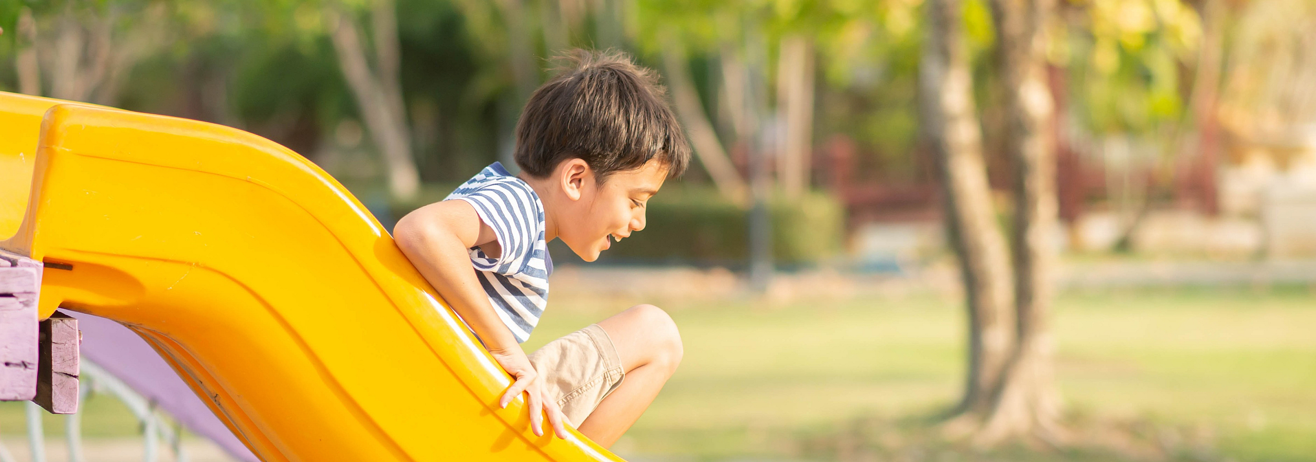 kid on slide