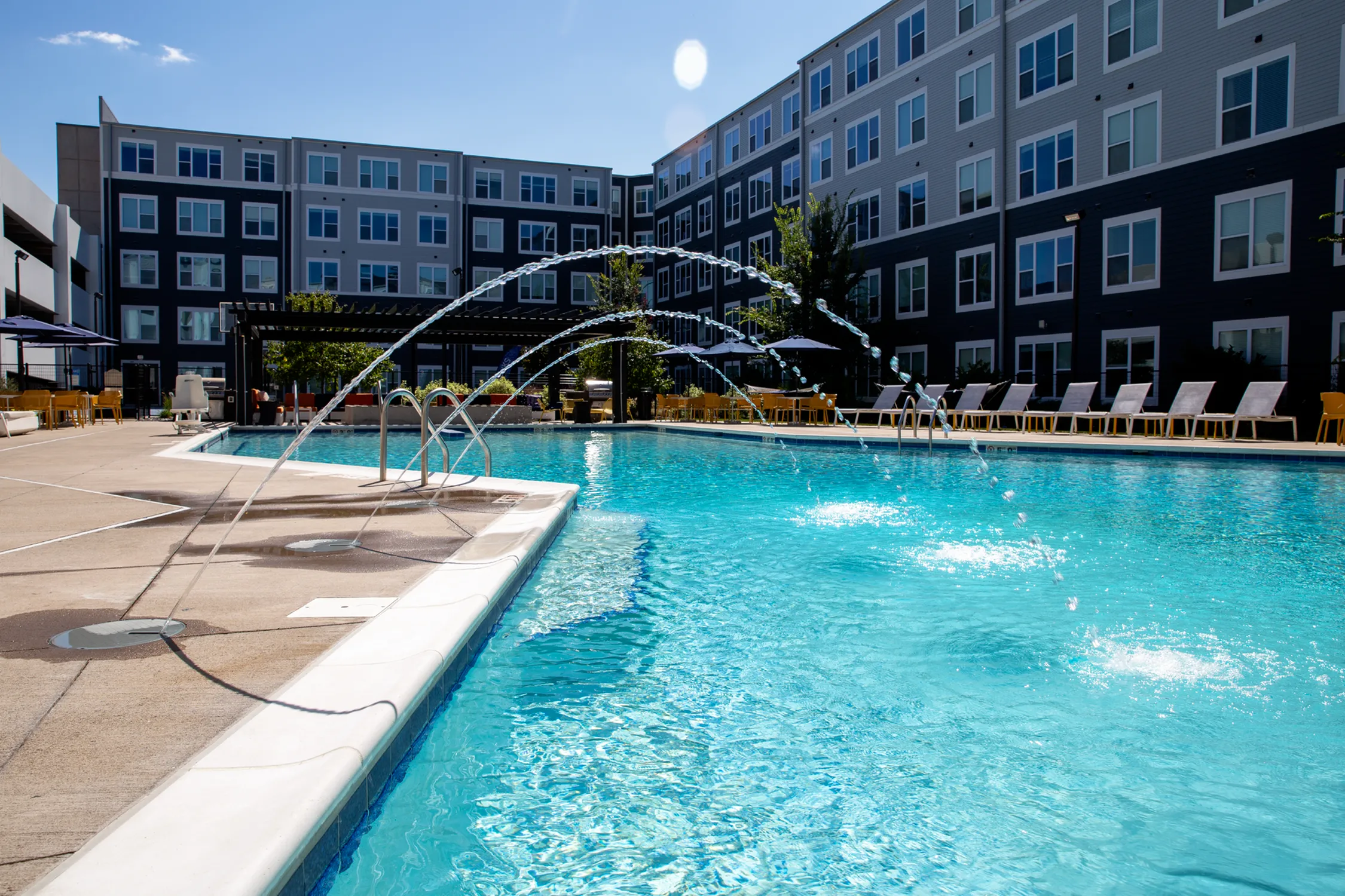 Loungers by the Pool | The Banks Student Living | Coralville, Iowa
