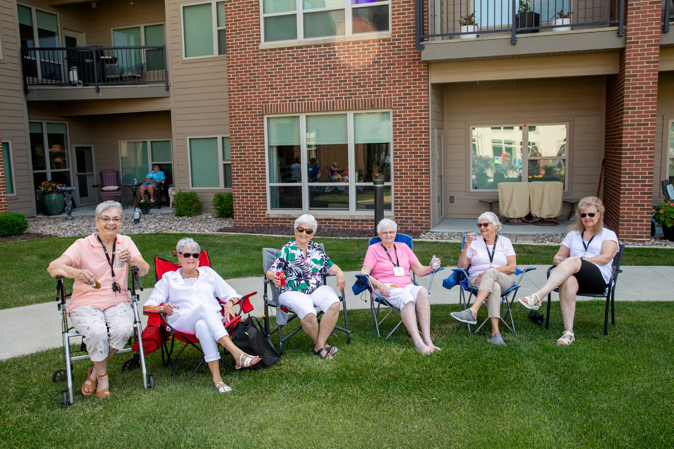 Residents Enjoying Outdoor Seating | Attivo Trails Waukee | Waukee, Iowa