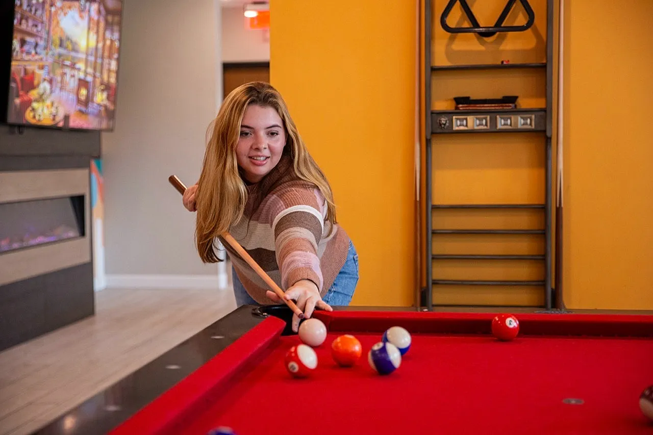 Resident Playing Pool | 2700 Lounge