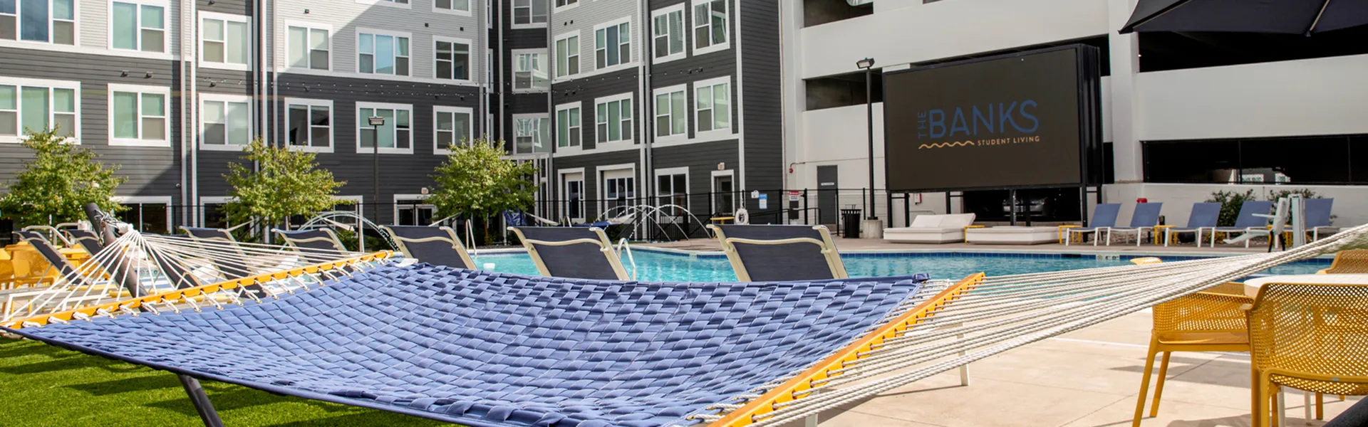 Hammocks by Pool | The Banks Student Living | Coralville, Iowa