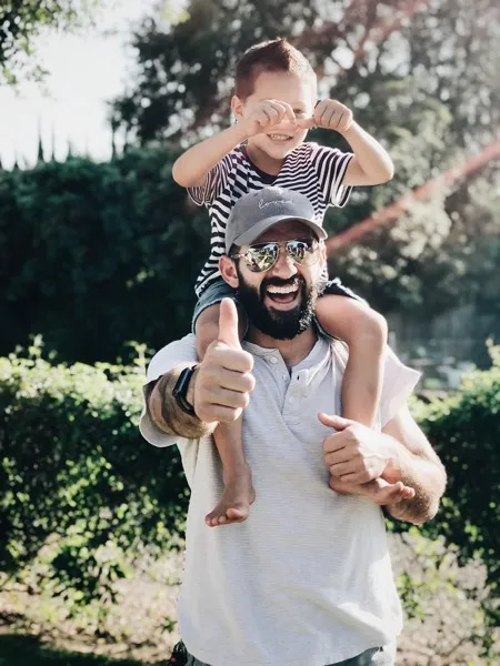 Father and Son smiling