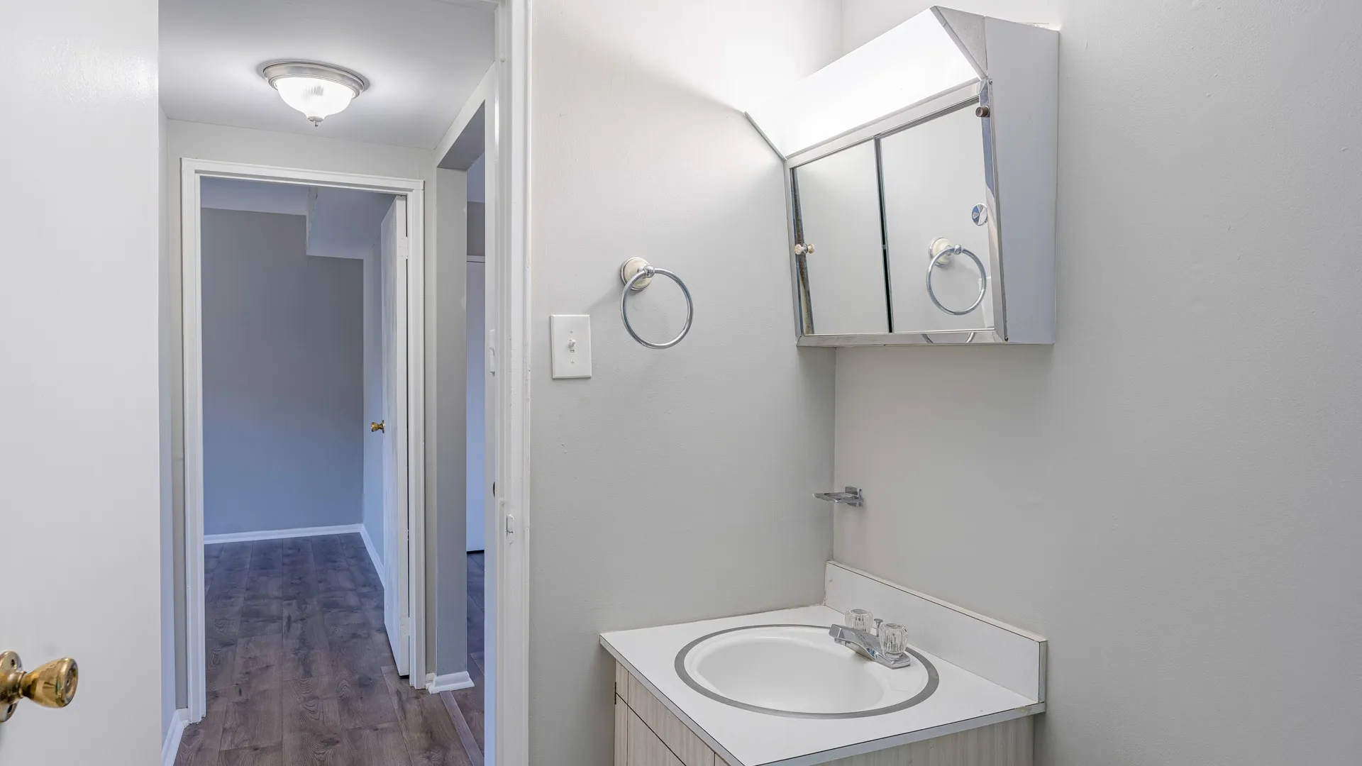 bathroom leading to hallway