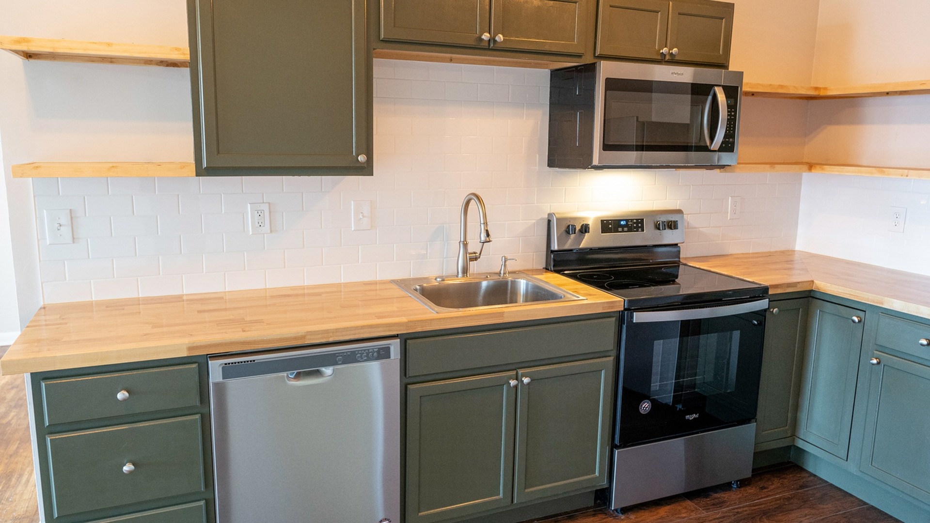 modern kitchen with appliances and lots of space