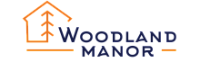 Elegant Woodland Manor logo featuring a stylized house outline with an integrated tree design, exuding warmth and nature-inspired living.