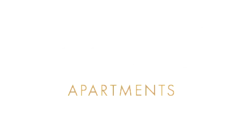 Elegant Woodcrest Village Apartments logo featuring sophisticated typography with a modern touch.