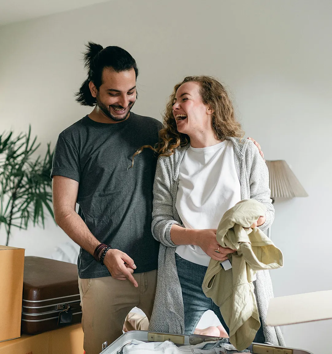 couple unpacking in new apartment