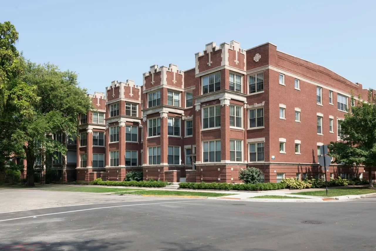 Exterior of 5135-45 South Ingleside a handsome twenty two unit three story vintage red brick building on a corner lot in Hyde Park.