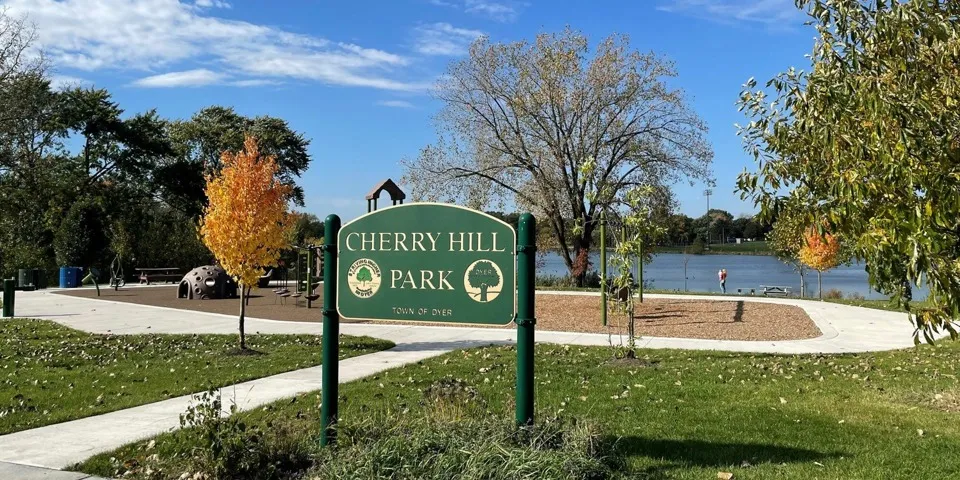 Cherry Park Sign with pond in the background Dyer, Indiana