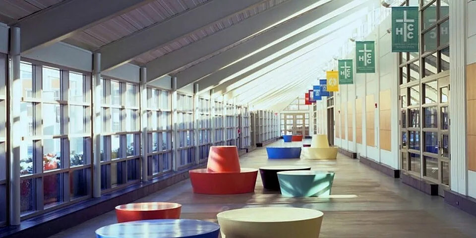 A seating area with windows and colorful furniture at the Lawndale Christian health facility.