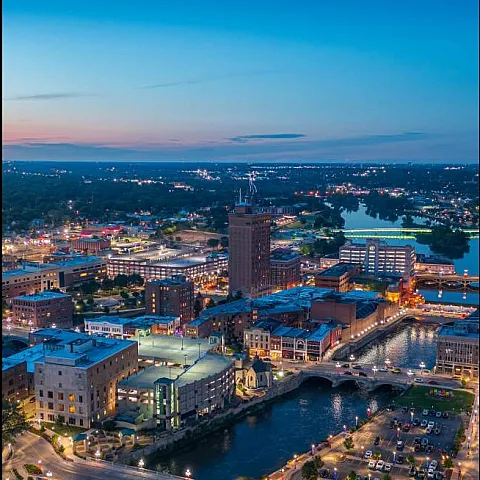 Aerial photo of downtown Aurora at dusk