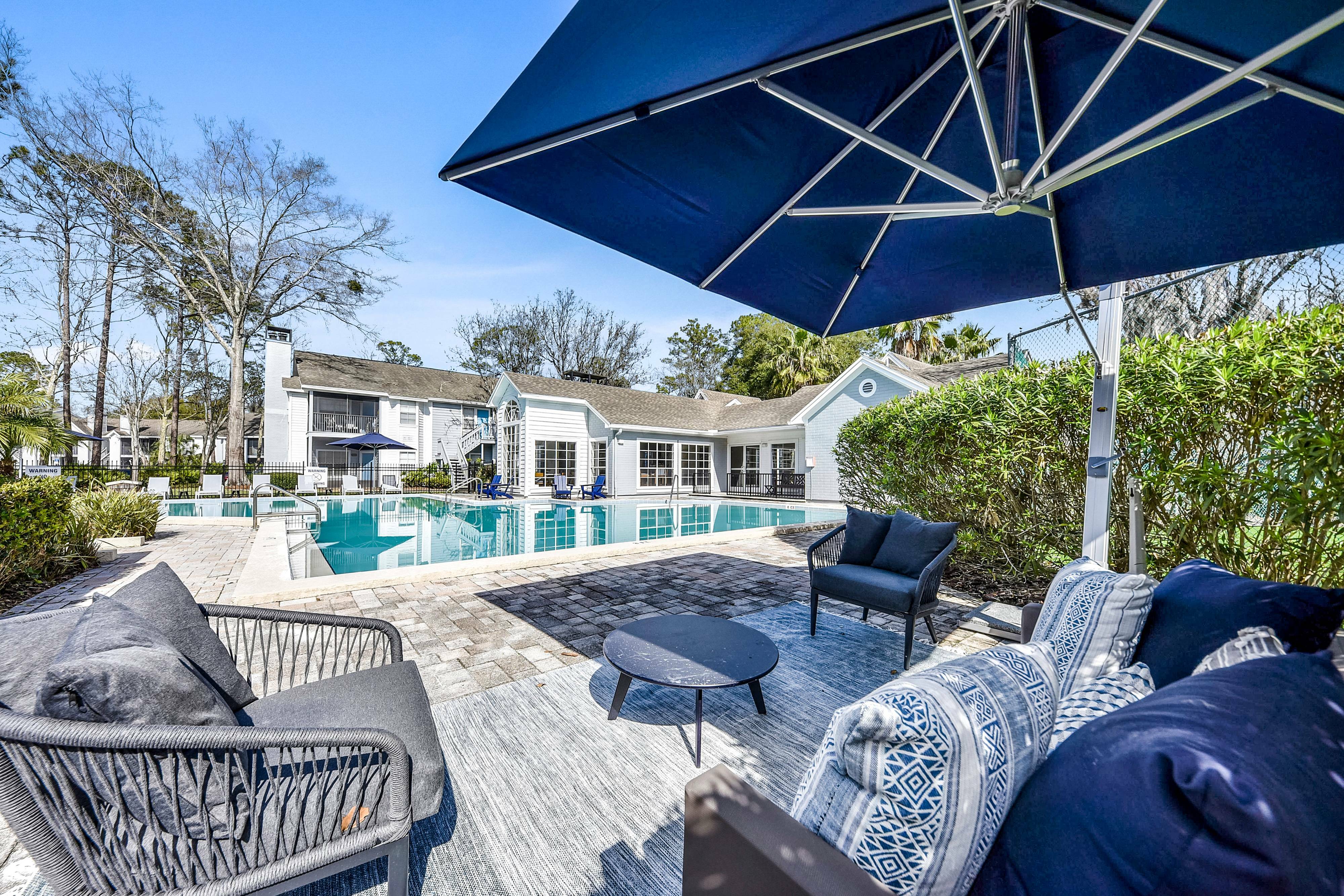 Sparkiling pool with lounge seating