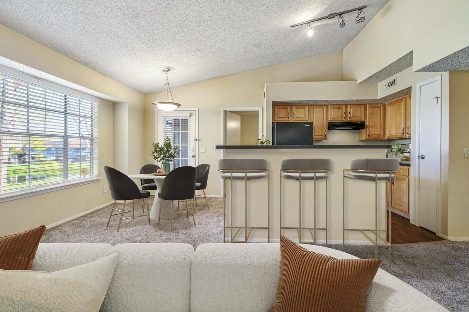 open living space with vaulted ceiling