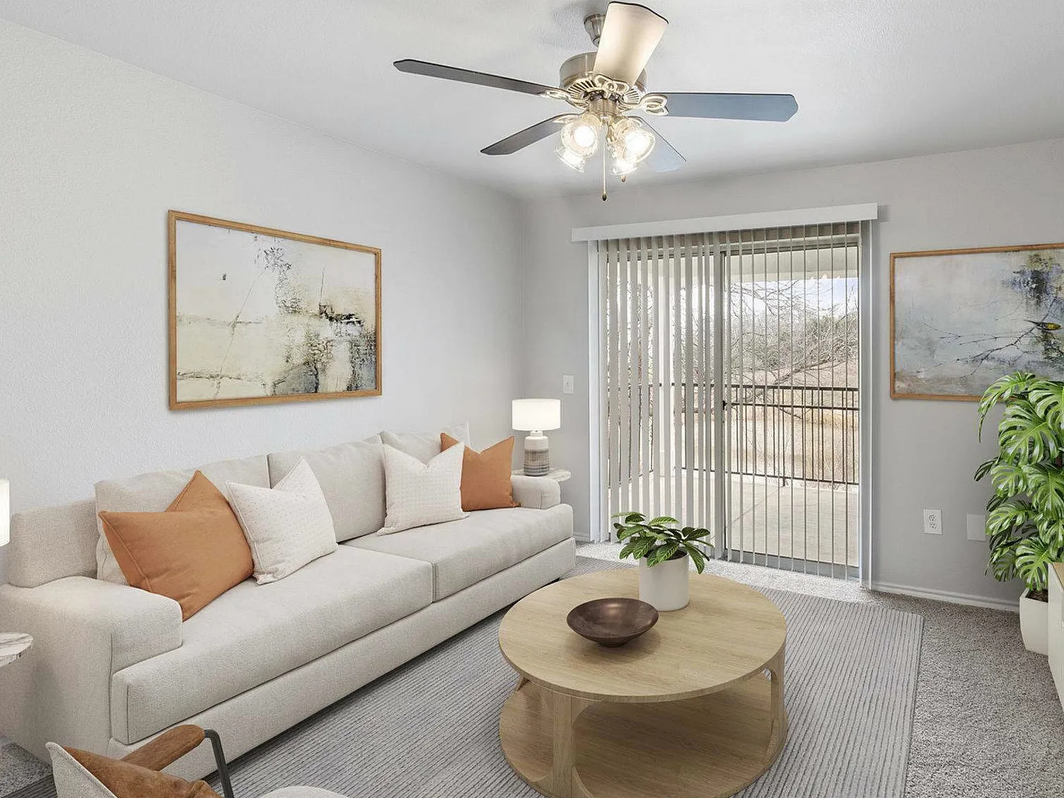 ceiling fan and bright living space