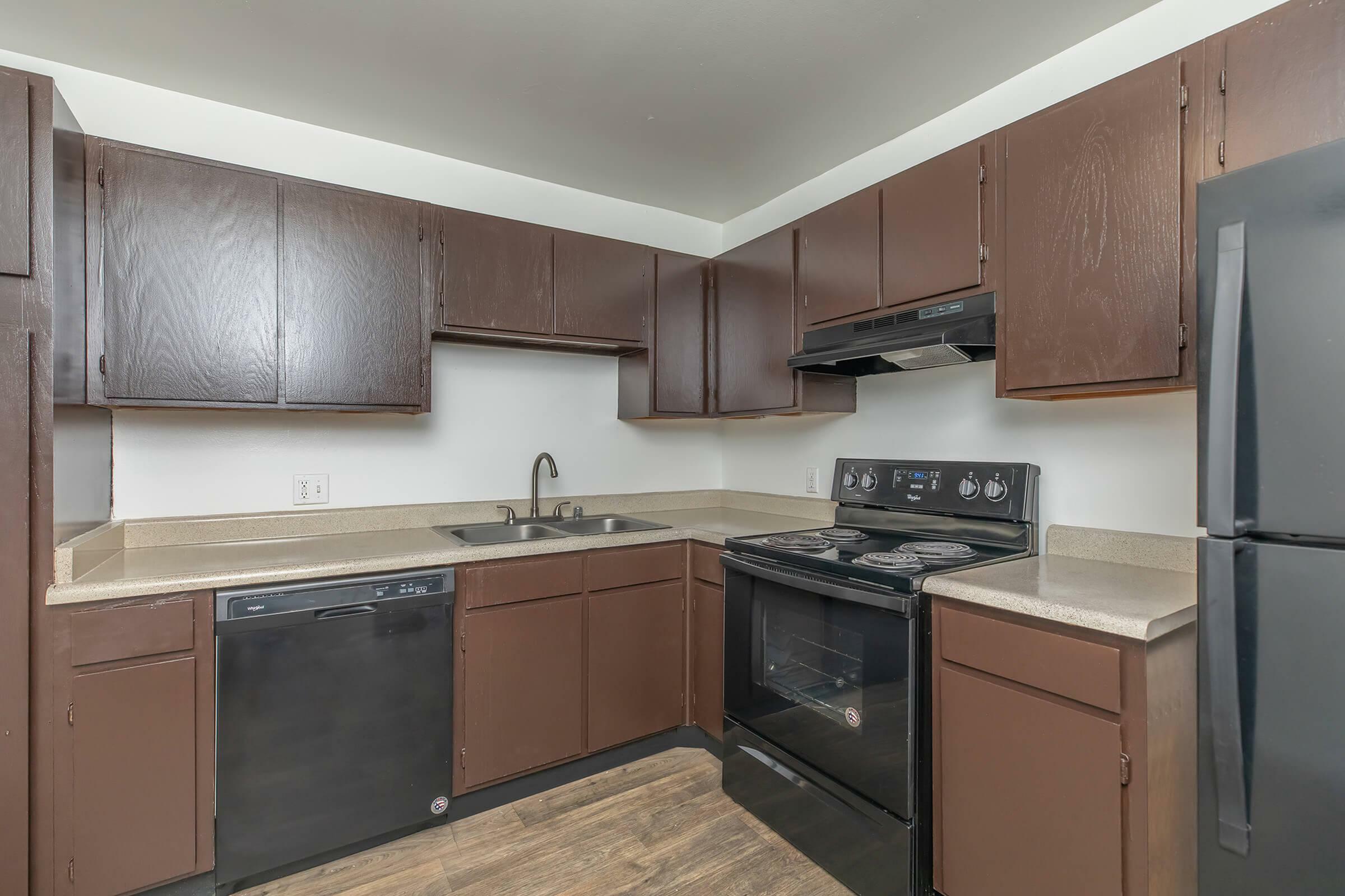 all electric kitchen with black appliances