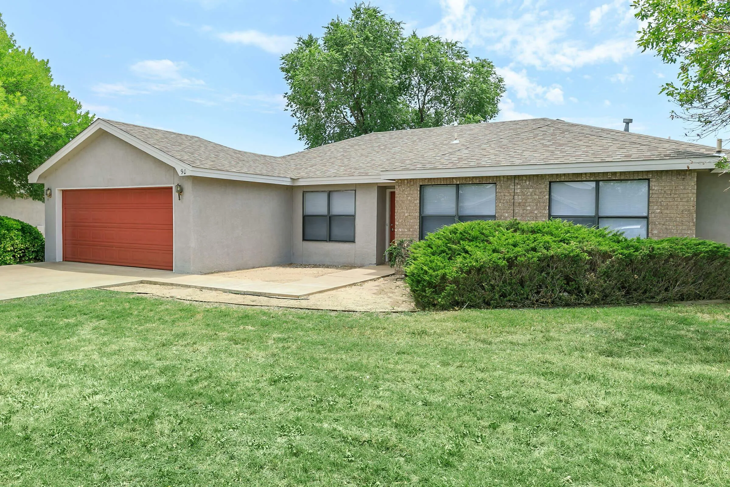 garage with lawn