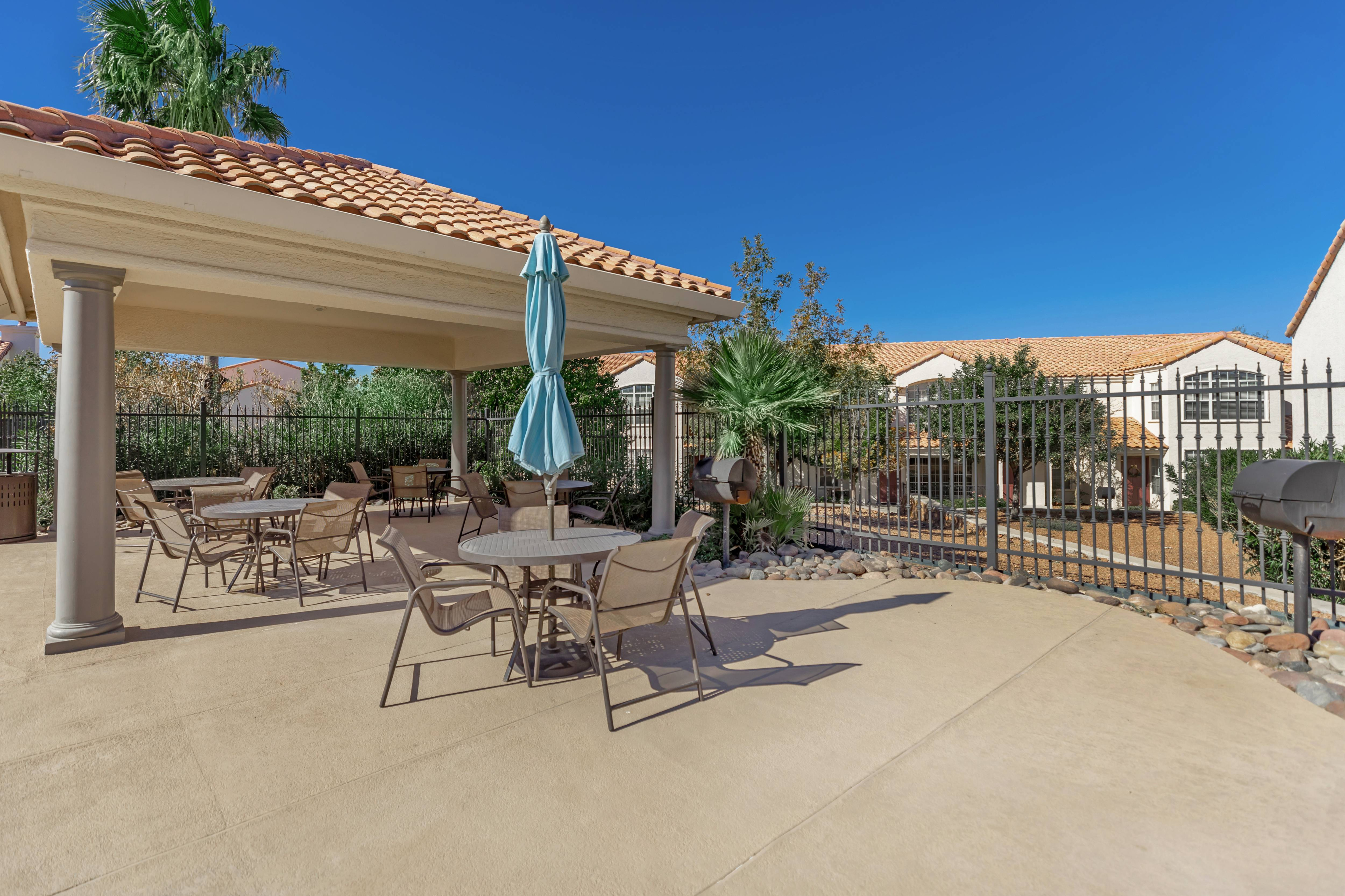 grill and picnic area beside the pool