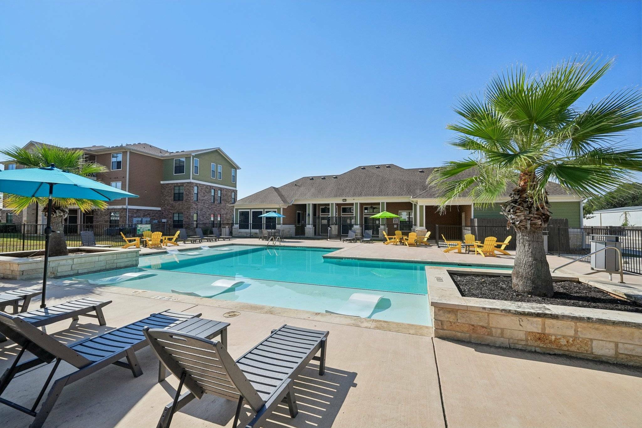 Sparkling Pool with Beach Entry and Sundeck