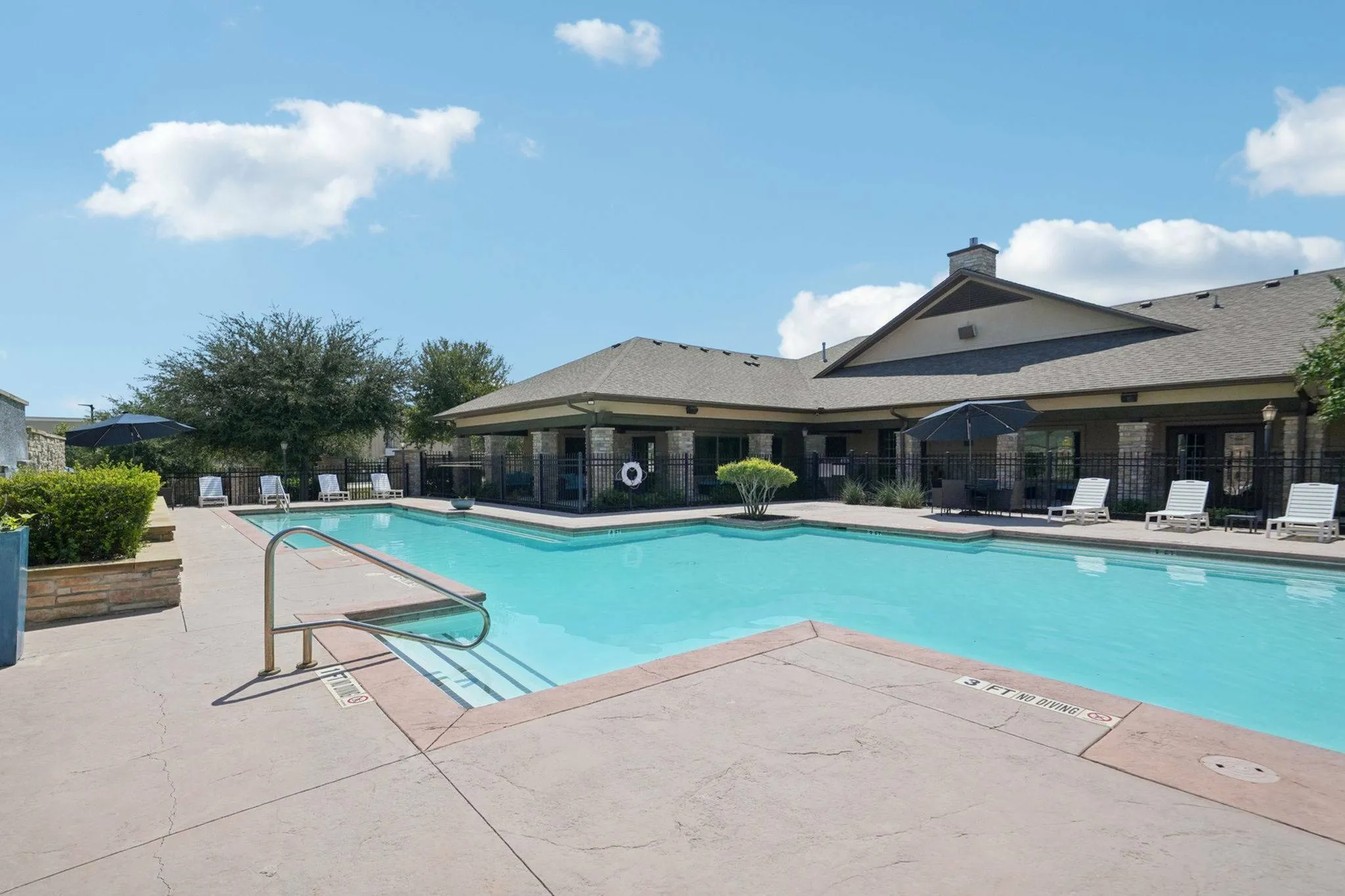 pool with lounge seating