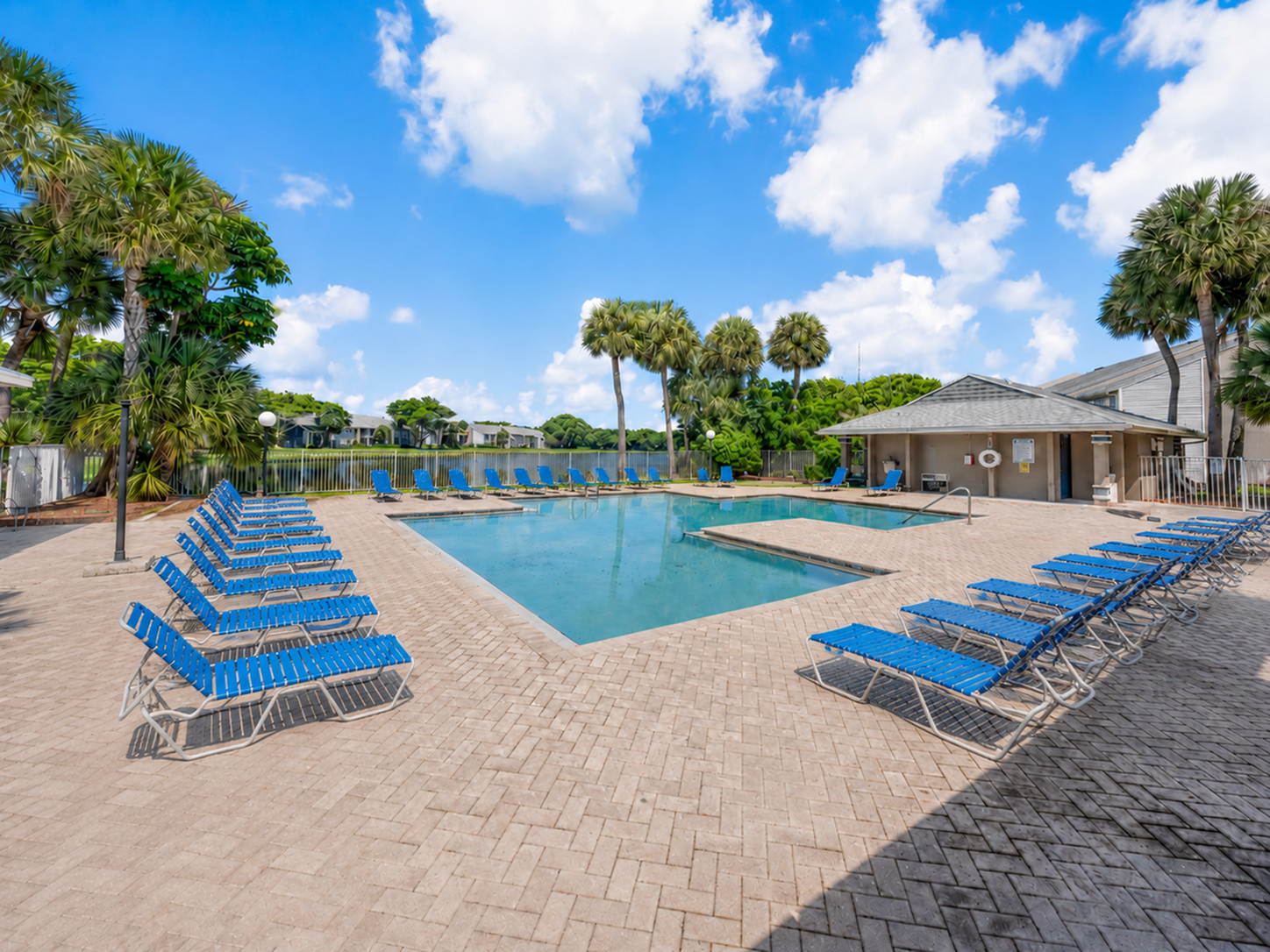 sparkling pool with lounge furnature