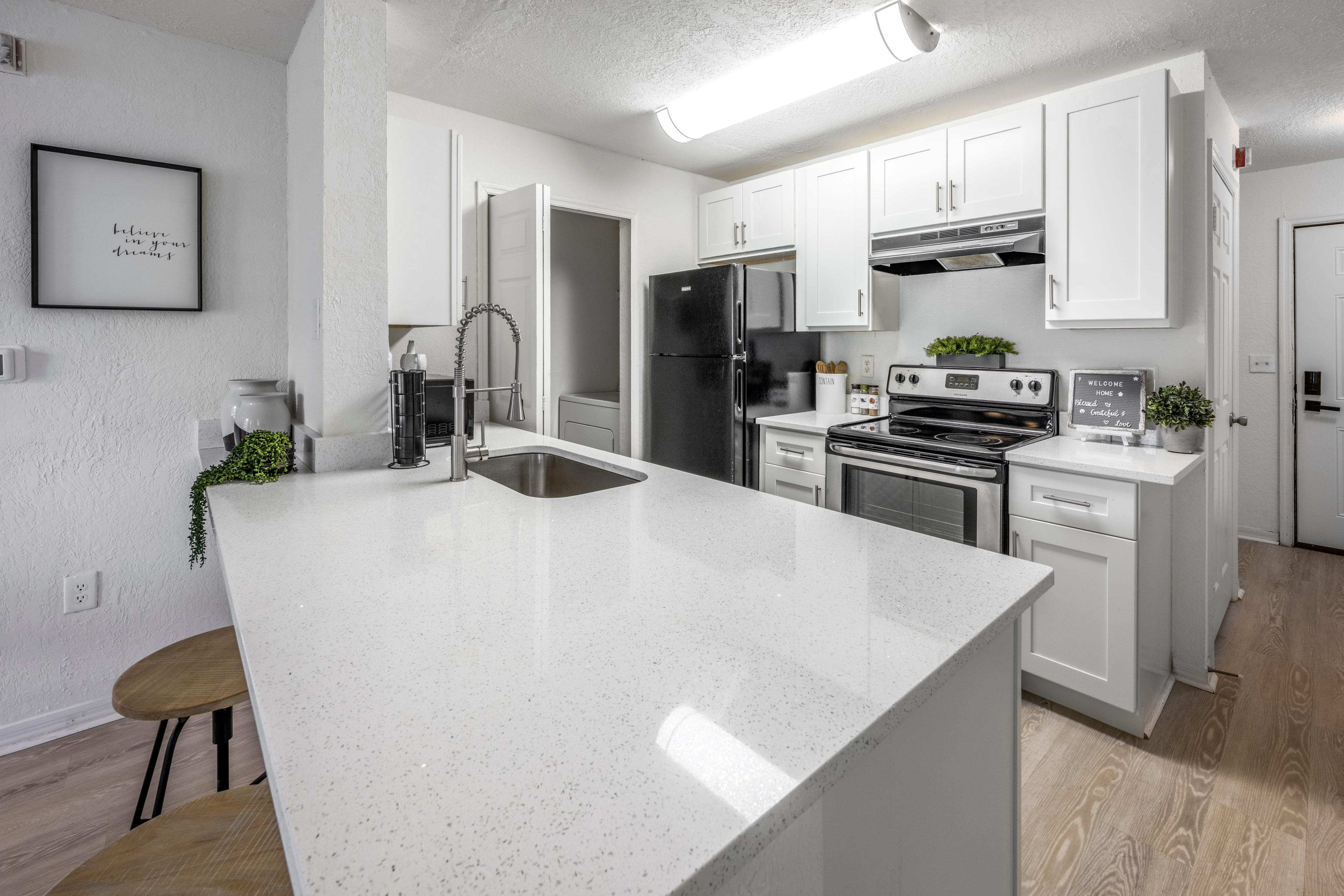state of the art stainless steel appliances in the upgraded kitchen