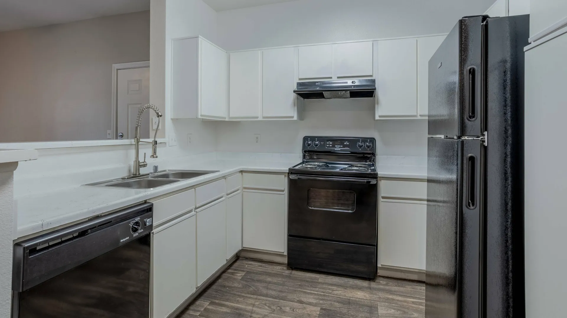 state of the art kitchen with black appliances