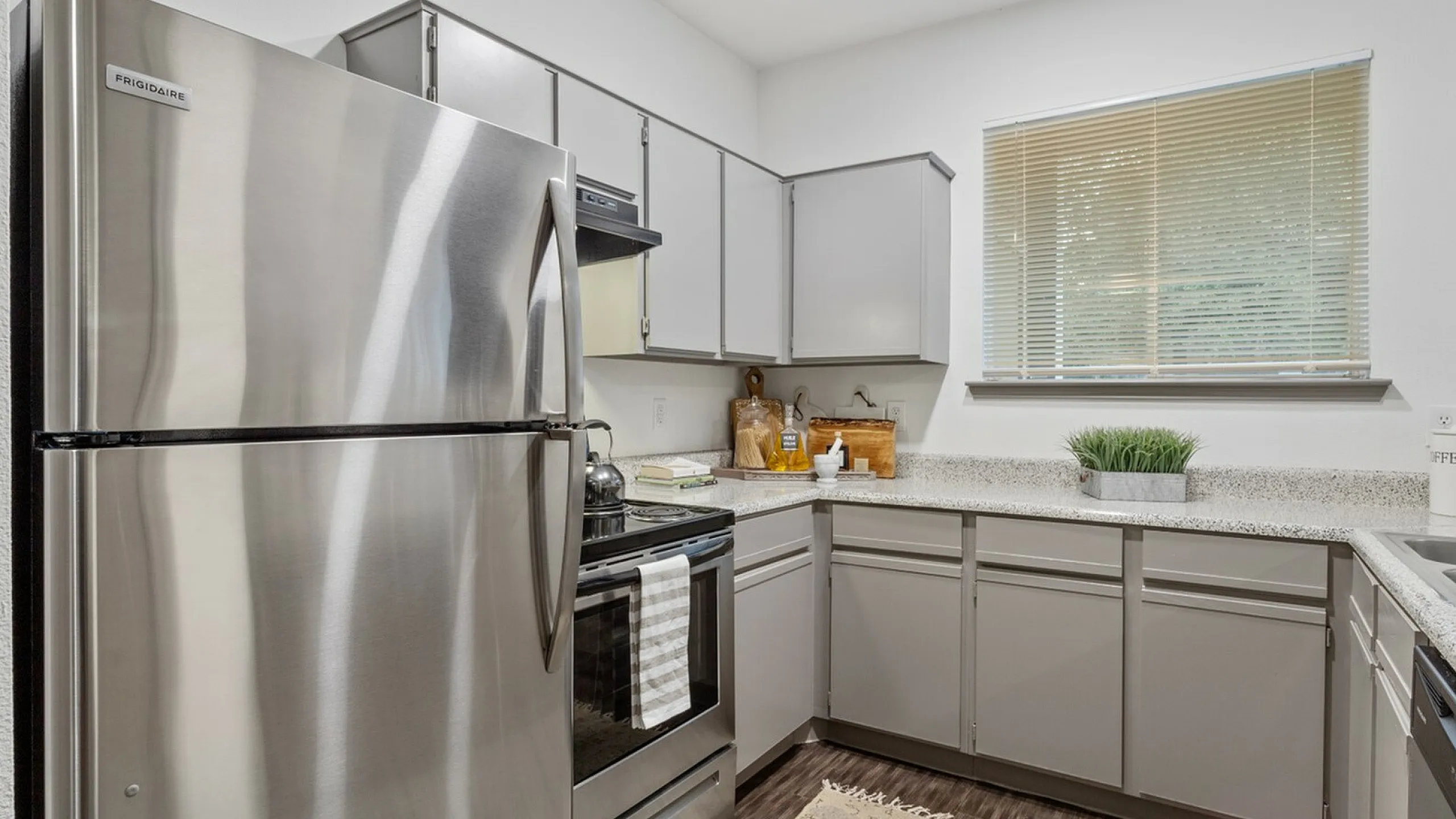 state of the art kitchen with stainless steel appliances