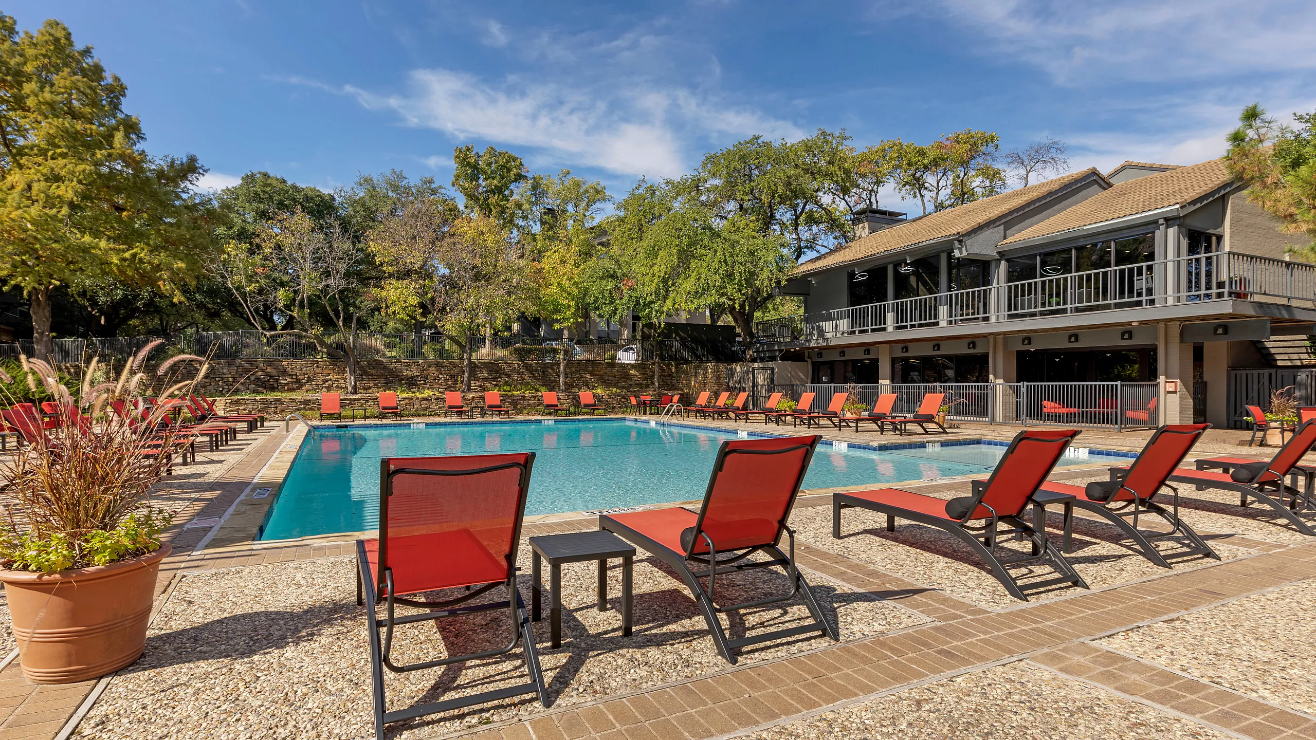 resort style pool with lounge seating