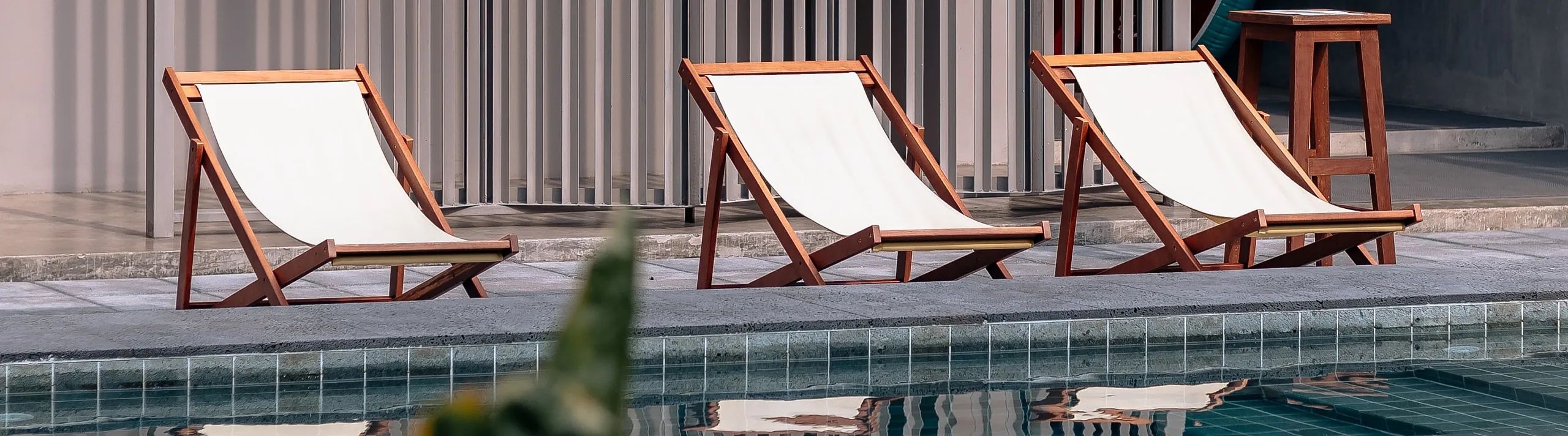 stock of seating beside a pool