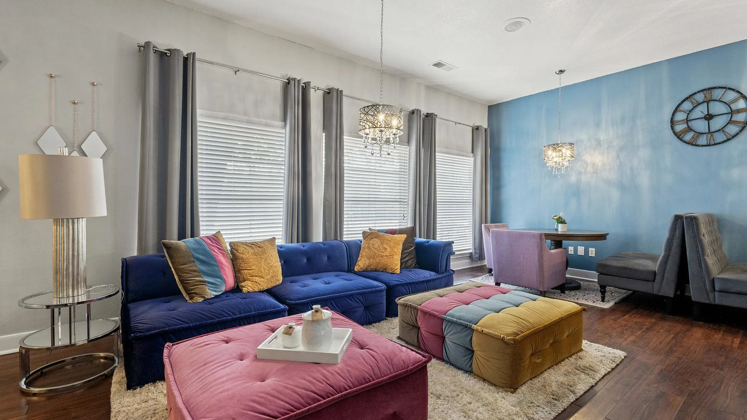 Resident Lounge with Blue Walls and Wooden Floors in Austin Texas