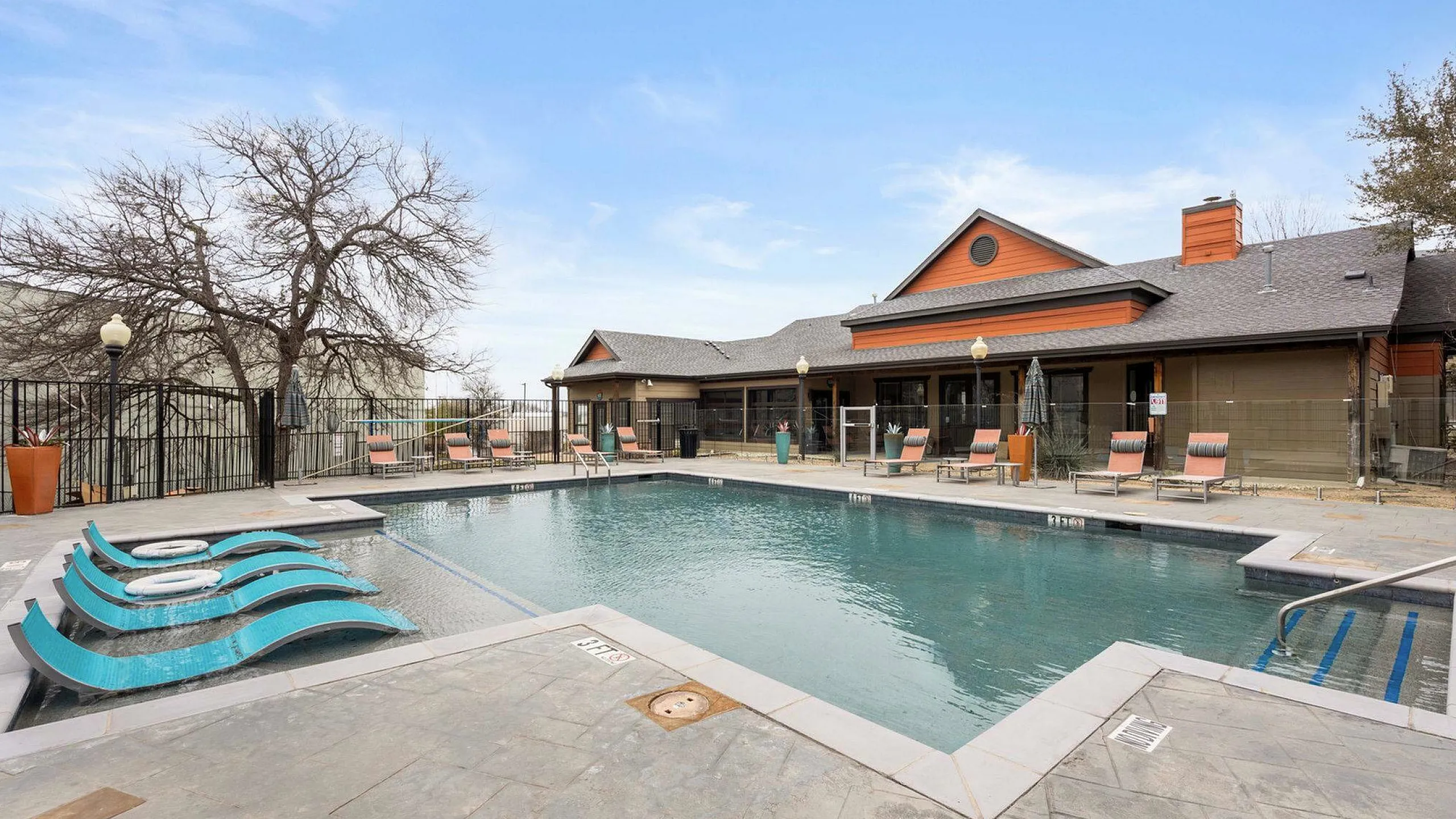 sparkilng pool with lounge seating