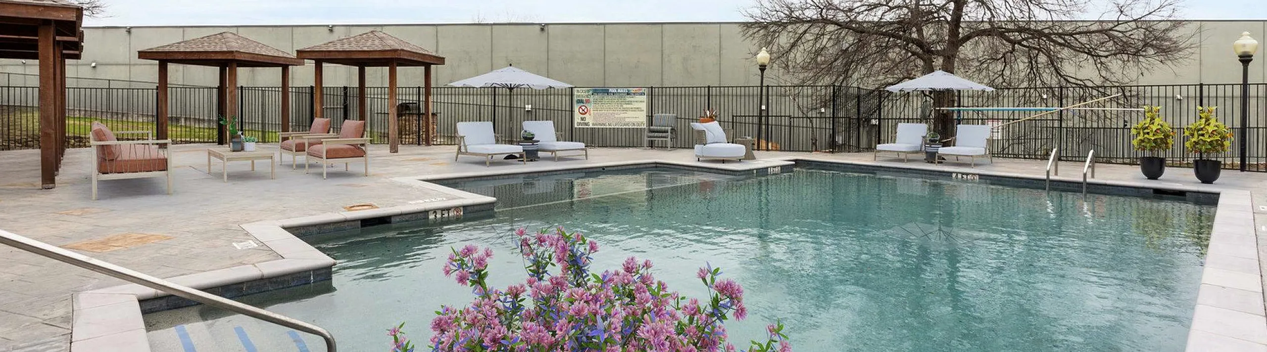 sparkilng pool with lounge seating