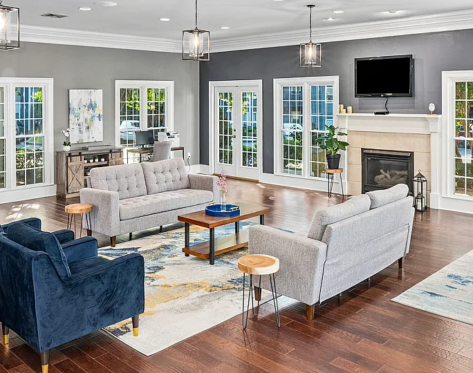 stylish leasing office with wood burning fireplace