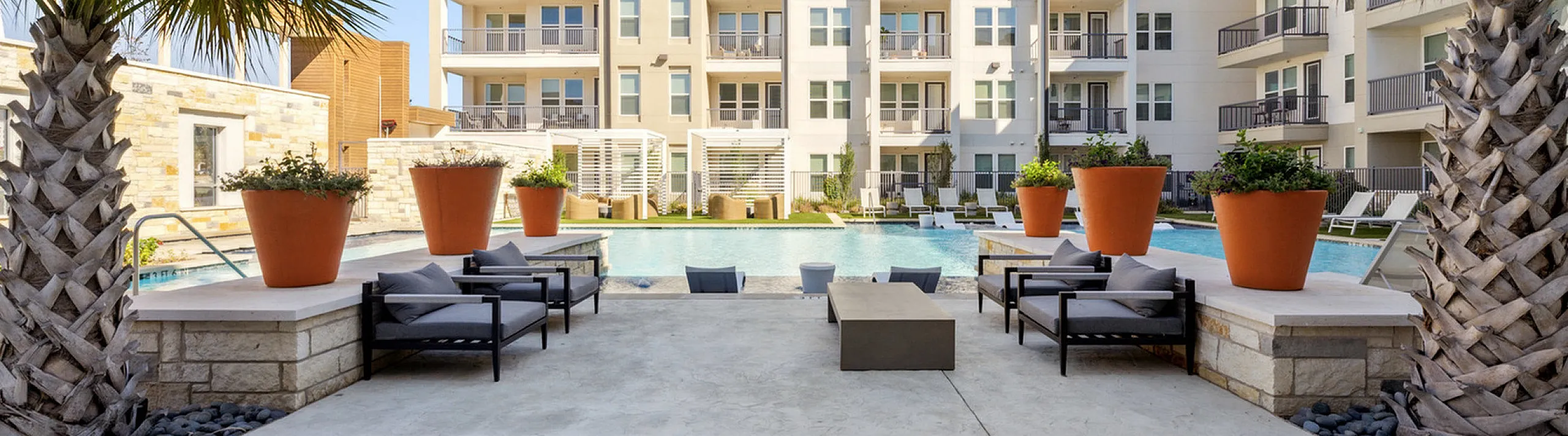 beautiful landscaping beside the pool