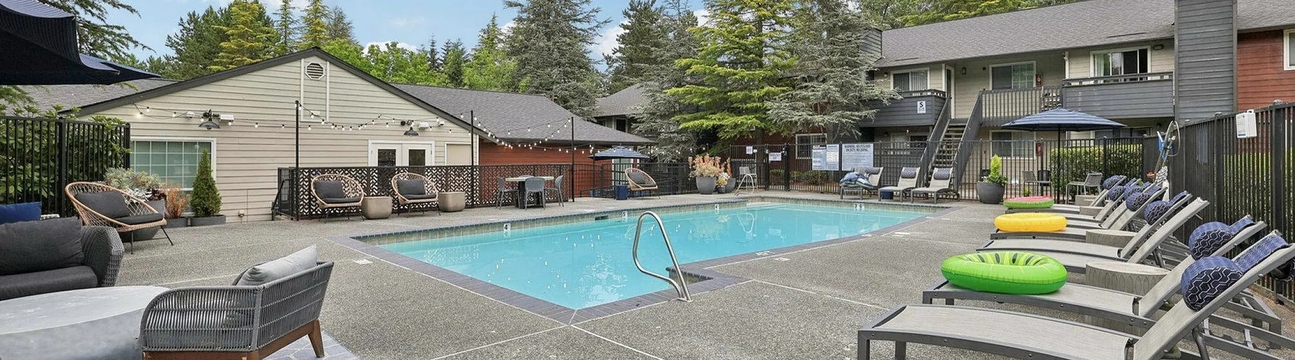 sparkiling pool with lounge seating