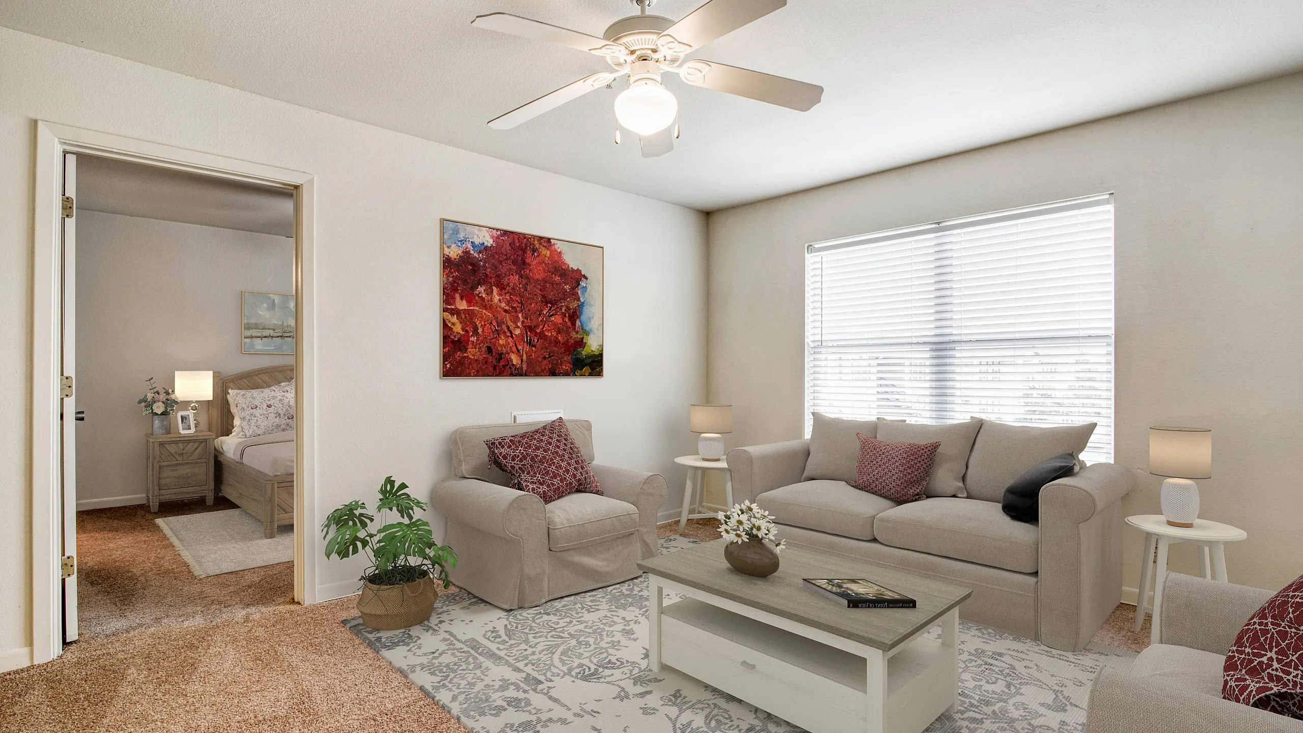 spacious living room with ceiling fan