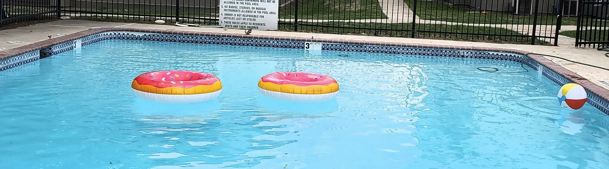 sparkiling pool with floaties