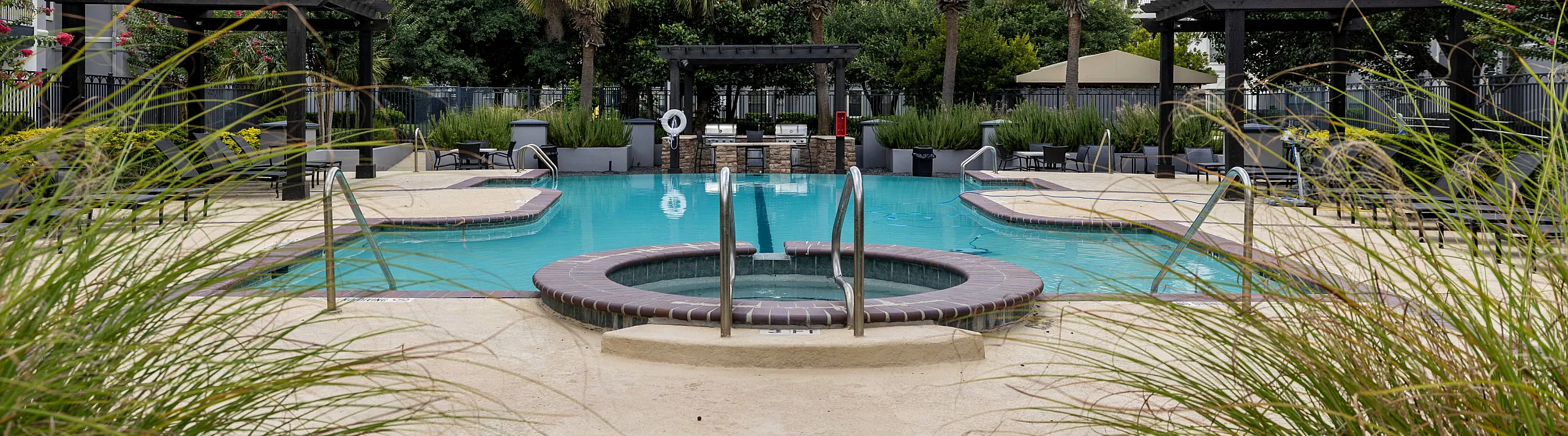 beautiful landscaping around the pool