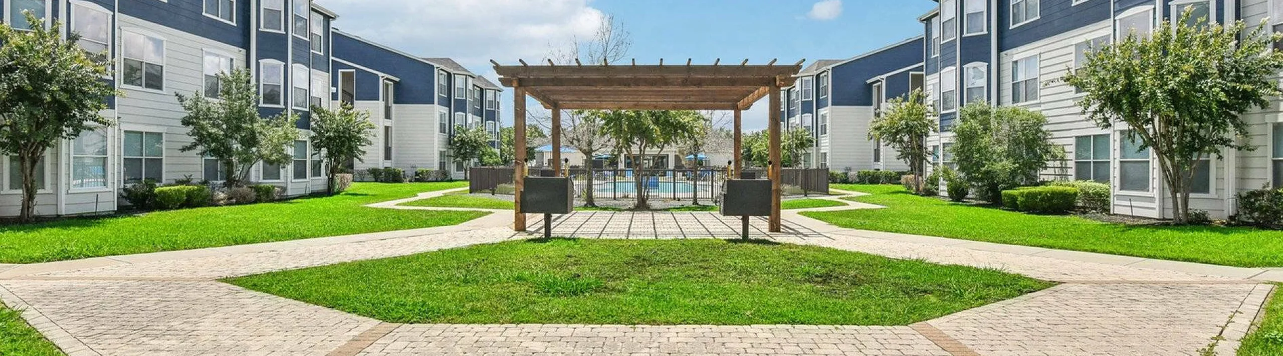 outdoor grill next to the pool