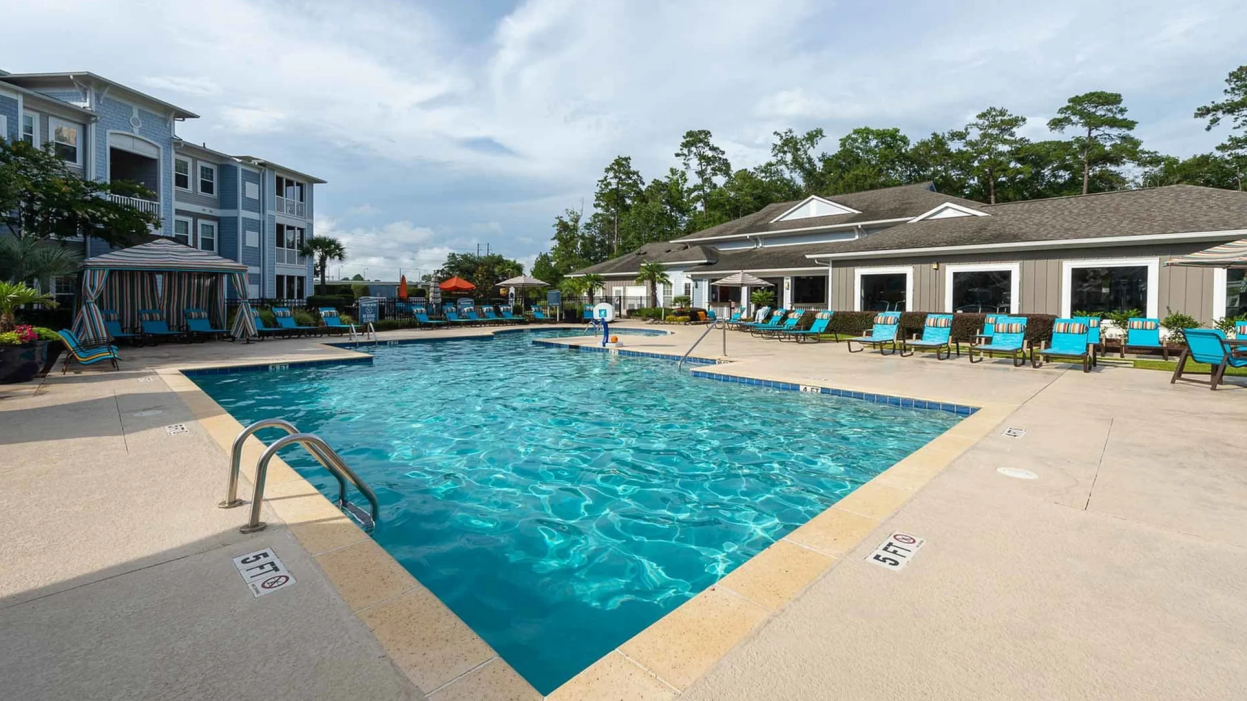 sparkling pool with resort style seating