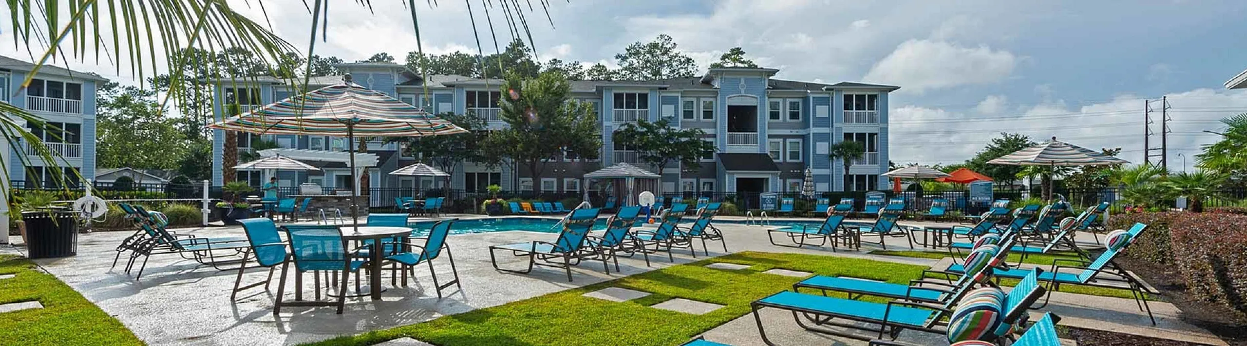 resort style lounge seating beside the pool